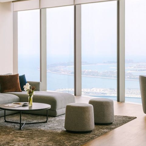 Count the super-yachts from your floor-to-ceiling windows 
