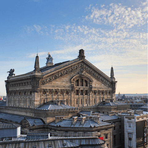 Take a tour of the gilded Opera Garnier, a ten-minute walk away