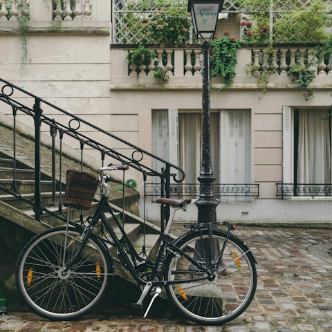 Explore the vibrant heart of central Paris on foot or by bike