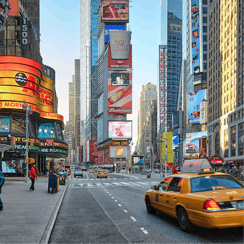 Hop on the subway and explore dazzling Times Square