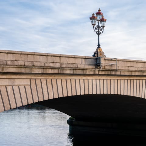 Enjoy a scenic stroll along Putney Bridge, just a fifteen-minute walk away