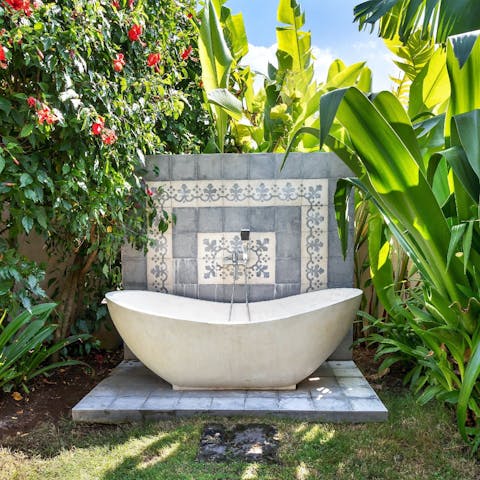 Take a soak in the outdoor bathtub, set in a private garden