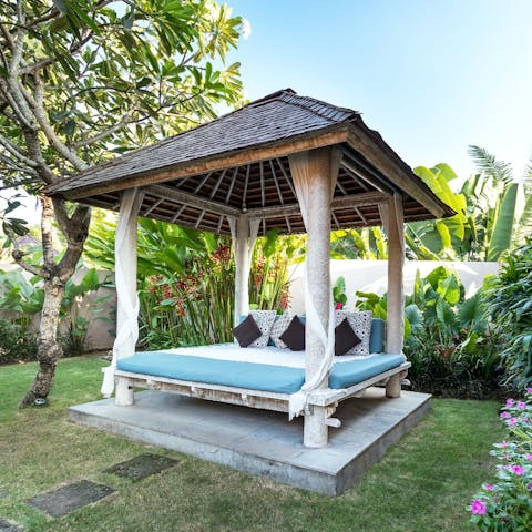 Relax in the shade on the comfortable daybed