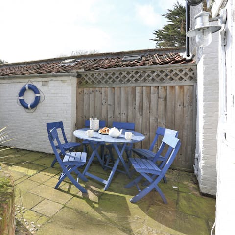 Fire up the barbeque and grill some Suffolk seafood in the sunny courtyard garden