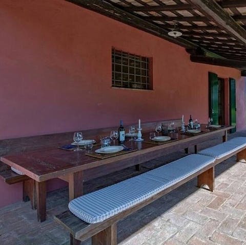 Hold feasts around the huge al fresco dining table