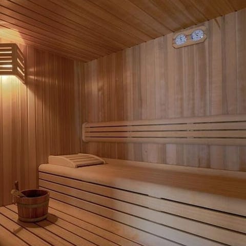 Unwind in the shared sauna after a morning workout in the gym