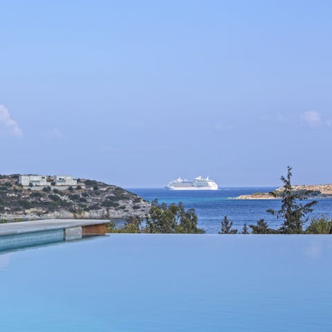 Gaze into the tranquil sea from the infinity pool
