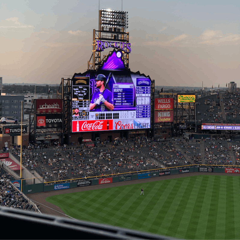 Catch a ball game at Coors Field, half a mile from your apartment