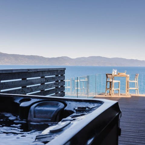 Admire the views of Tahoe's Agate Bay from the private hot tub