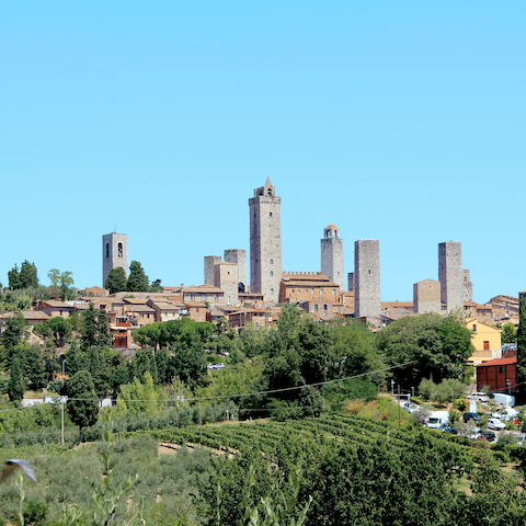 Sample local cuisine as you gaze at the towers in San Gimignano 