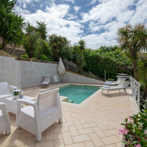 Soak up the sun from in or beside the private pool