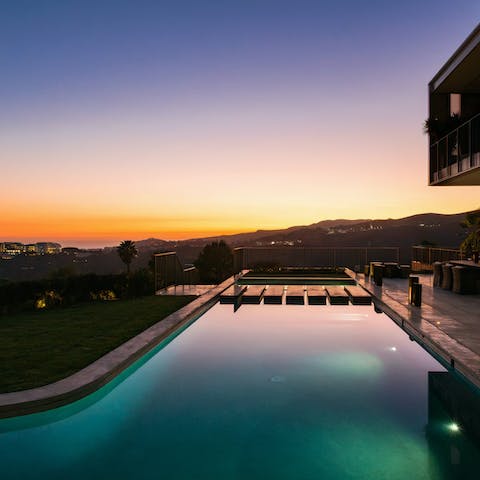 Take a sunset dip in the endless infinity pool
