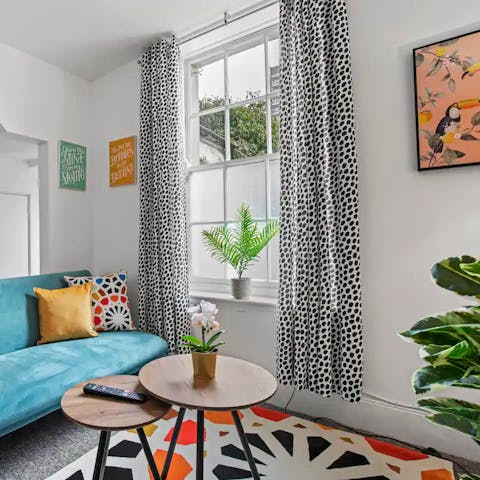 Enjoy the bright colour scheme and pops of plant life in each room