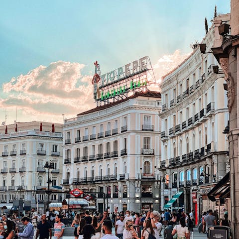 Enjoy people watching at Puerta del Sol – eighteen minutes away by train