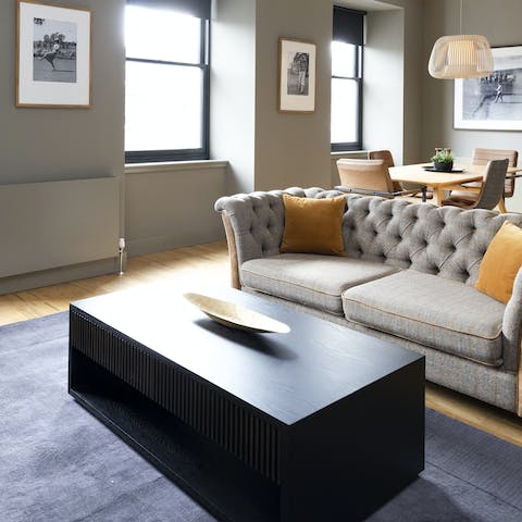 Lounge on the comfortable sofa after a busy day with a glass of scotch and your favourite shows on the TV