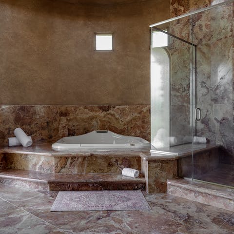 Enjoy a dip in the master bathroom's Jacuzzi