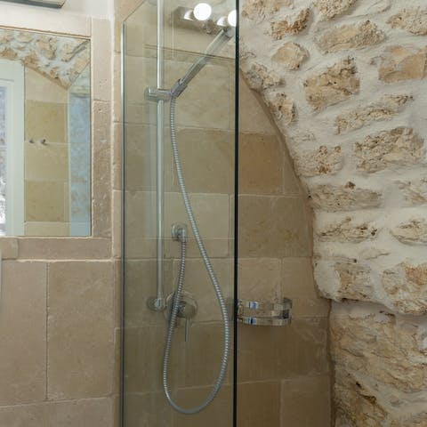 Rejuvenate in your stone-caved shower