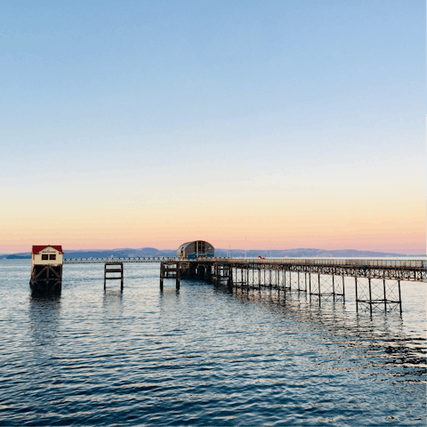 Spend the day down at the 1898-built Mumbles Pier, a short drive away