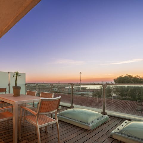 Take in the lovely vistas over Venice from the private balcony