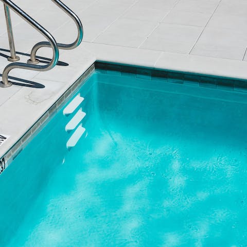 Take a refreshing dip in the communal pool 