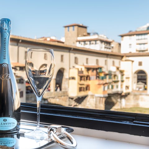 Sip champagne overlooking Ponte Vecchio