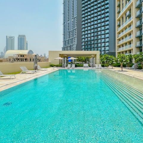 Cool off in the shared pool while admiring the views of Burj Khalifa