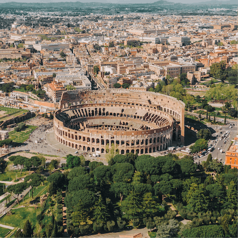 Take an eight-minute stroll to the ancient Colosseum – visit in the early morning to avoid the crowds