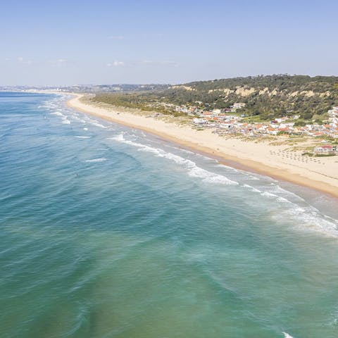 Venture five kilometres to the restaurant-lined beach of Fonte da Telha