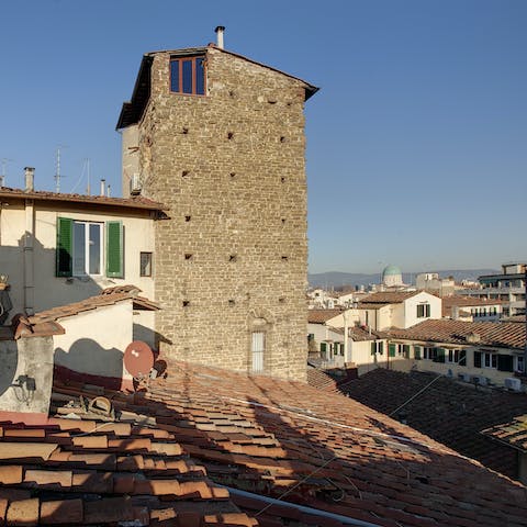 Stay in a medieval tower in the heart of the city 