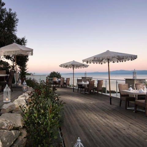 Head to the all-day bar-restaurant for a sunset dinner on the beach