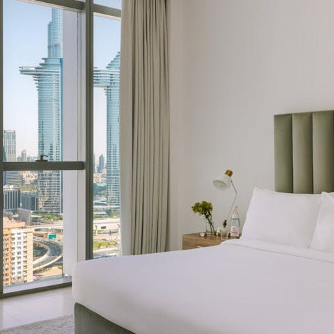 Wake up to the city vistas in the bedroom
