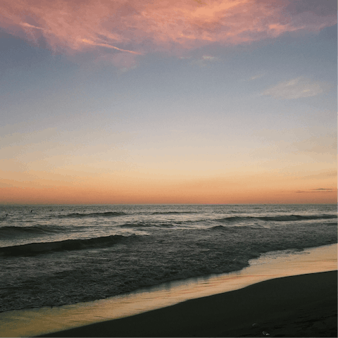 Make the drive to Playa de los Álamos and spend long, lazy days on the beach