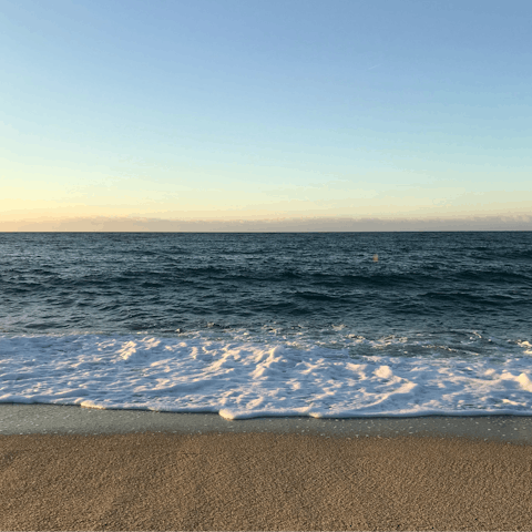 Take a stroll along the golden sand of Guadalmina Beach