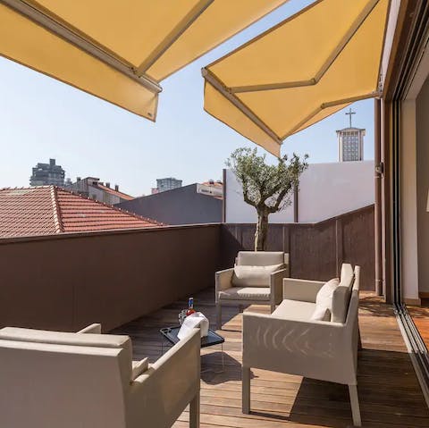 Get a beer from the apartment's honesty bar and enjoy out on the terrace