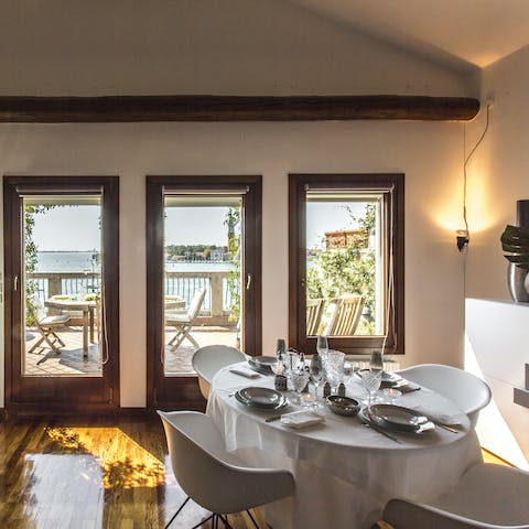 Enjoy the Venice vistas from your dining table inside