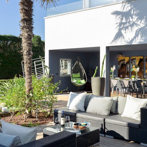 Dine alfresco on the palm-lined patio terrace