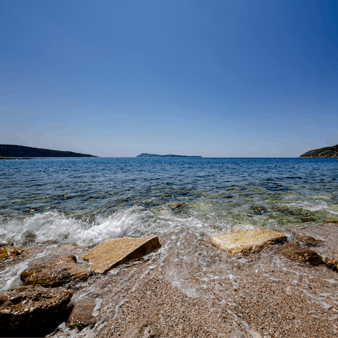 Take a dip in the Adriatic Sea at Špadići Beach, half an hour away by car
