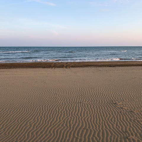 Enjoy a beach day at Spiaggia della Lecciona, a short drive away