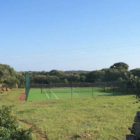 Stroll down to the tennis court for a morning game or two