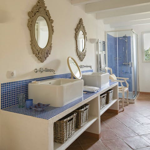 Freshen up in one of the luxury bathrooms