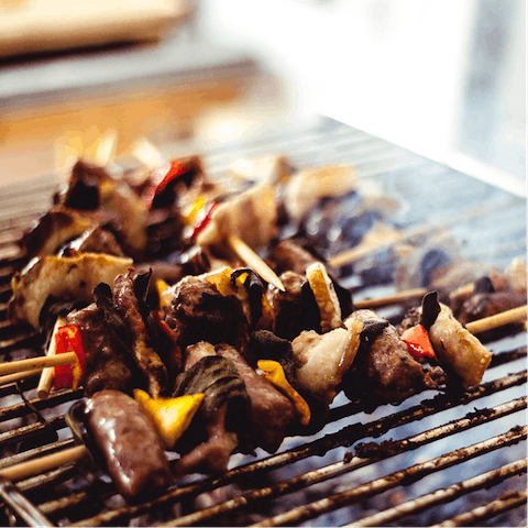 Grill some local seafood on the home's charcoal barbecue
