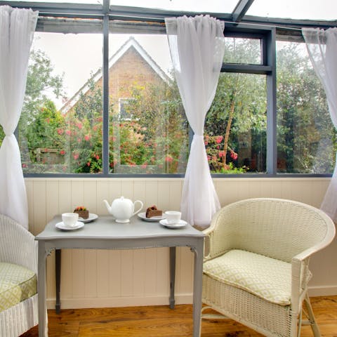 Enjoy coffee and a cake in your conservatory area, just off the master bedroom