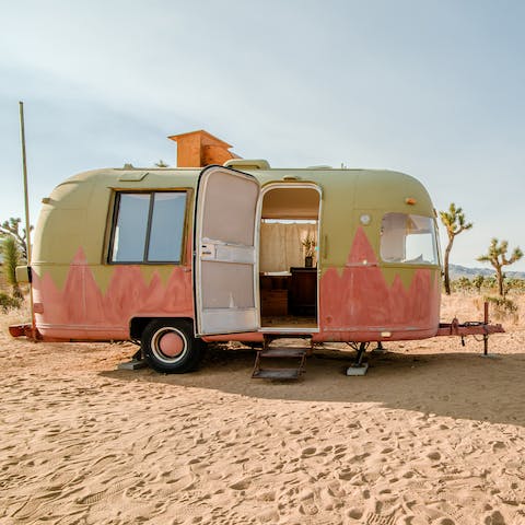 Immerse yourself in nature by waking up in a painted trailer in the desert 