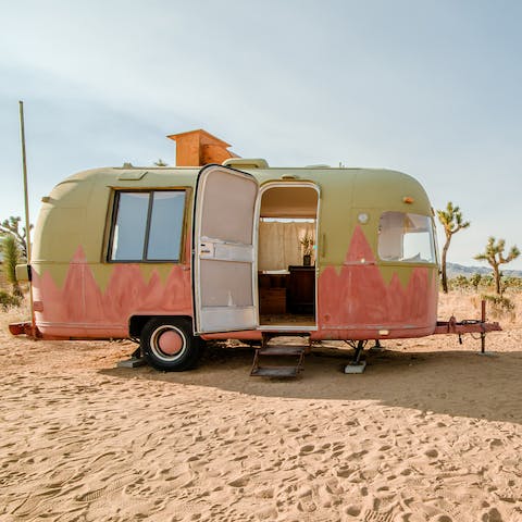 Immerse yourself in nature by waking up in a painted trailer in the desert
