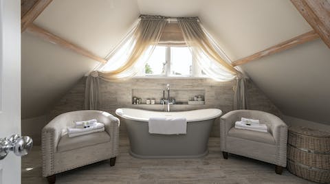 Treat yourself to a long, luxurious soak in the freestanding tub