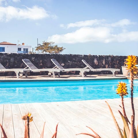 Relax poolside on the loungers and soak up the Spanish sun before a dip in the pool