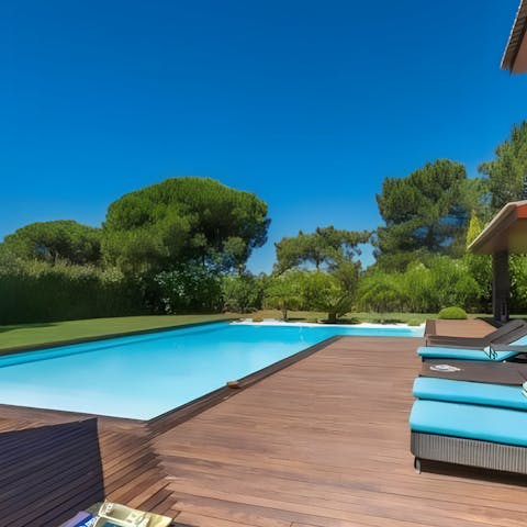 Spend leisurely days at home relaxing by the pool
