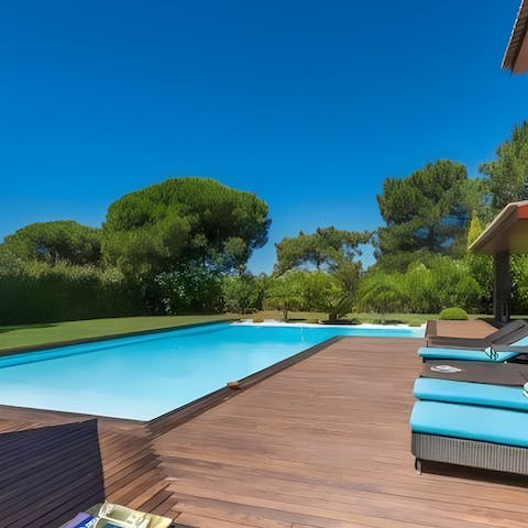 Spend leisurely days at home relaxing by the pool