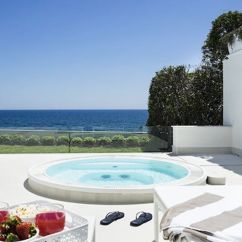 Simmer down with a dip in the jacuzzi and admire blissful sea views