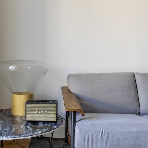 Lounge on the couch whilst listening to your favourite tunes on the Bluetooth speaker